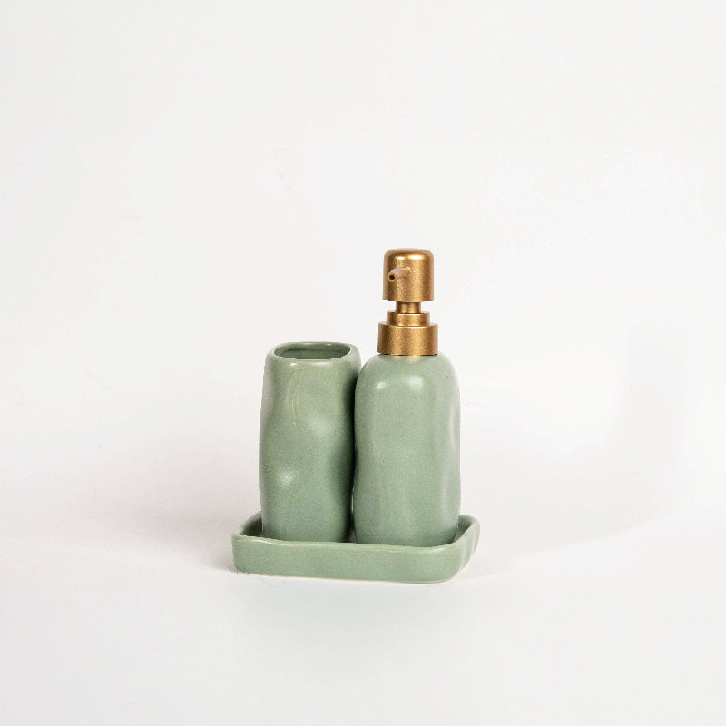 Luxury stone-effect soap dispenser and tumbler set with tray by the poolside