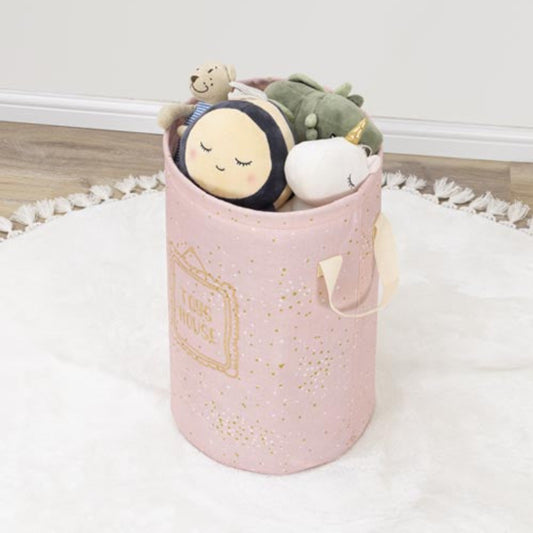 Pink storage bin with plush toys on a light wooden floor.