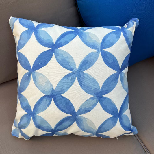 Blue geometric circle pattern cushion cover with watercolor abstract design on decorative pillow