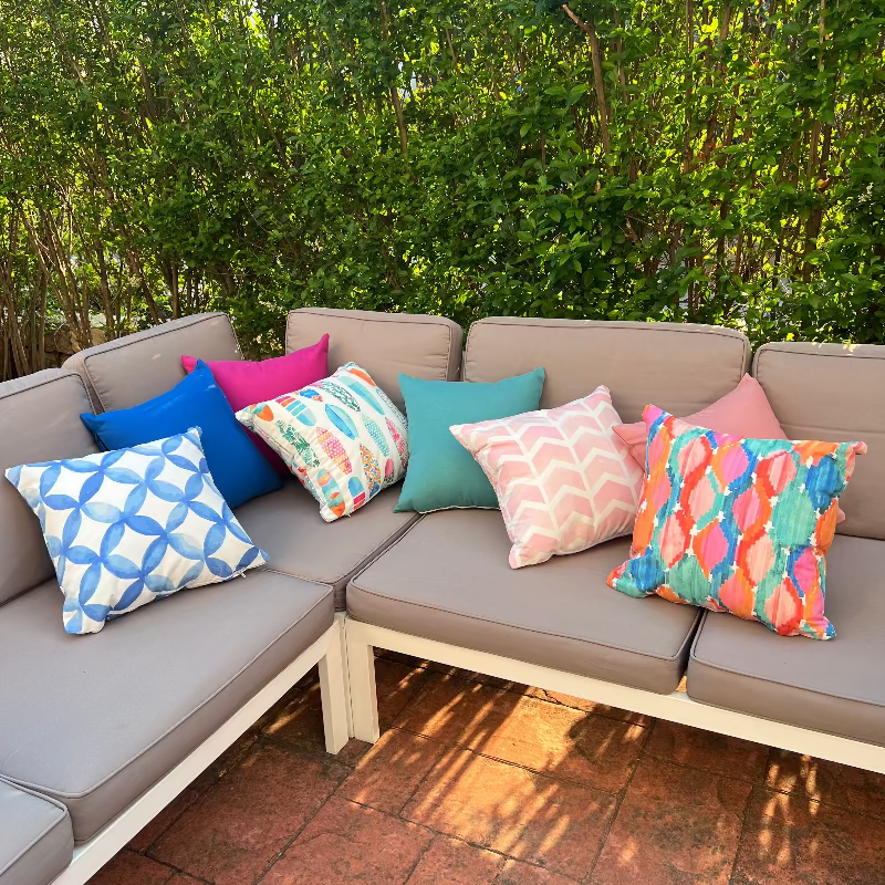 Colorful surfboard pattern cushion cover with tropical pastel designs on decorative pillow