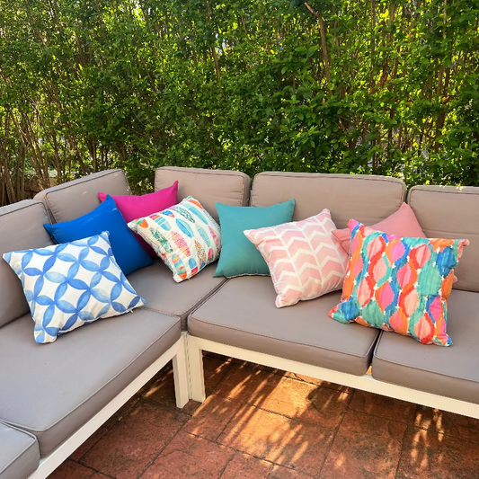 Colorful surfboard pattern cushion cover with tropical pastel designs on decorative pillow