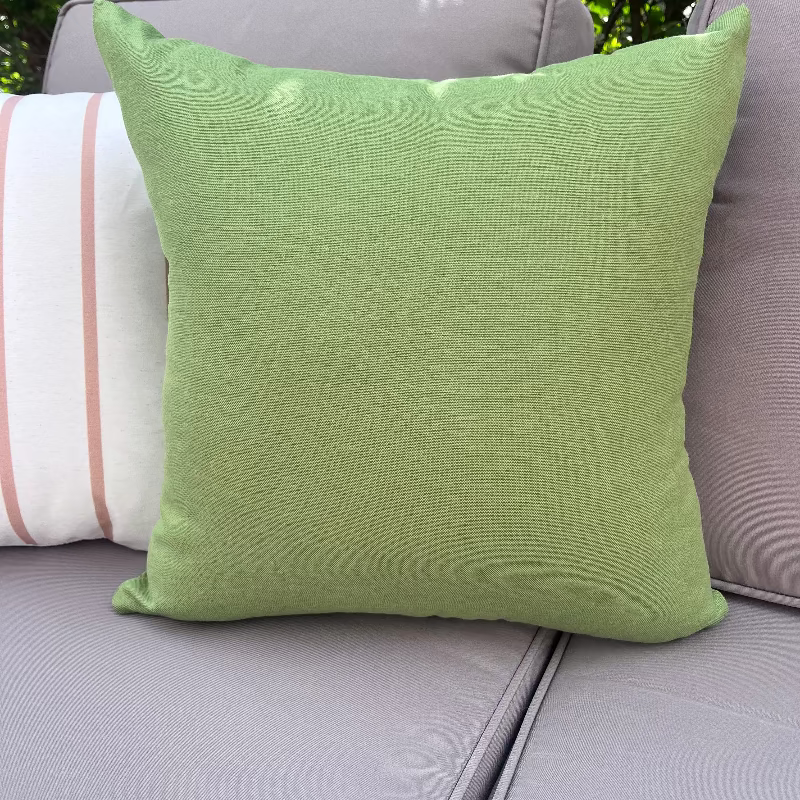Minimal white cushion with thin beige vertical stripes in a modern neutral design