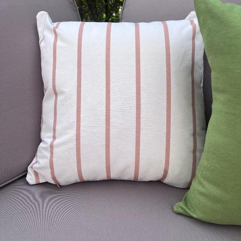 Minimal white cushion with thin beige vertical stripes in a modern neutral design