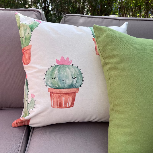 Cute watercolor cactus cushion cover with small potted plants on minimalist white decorative pillow