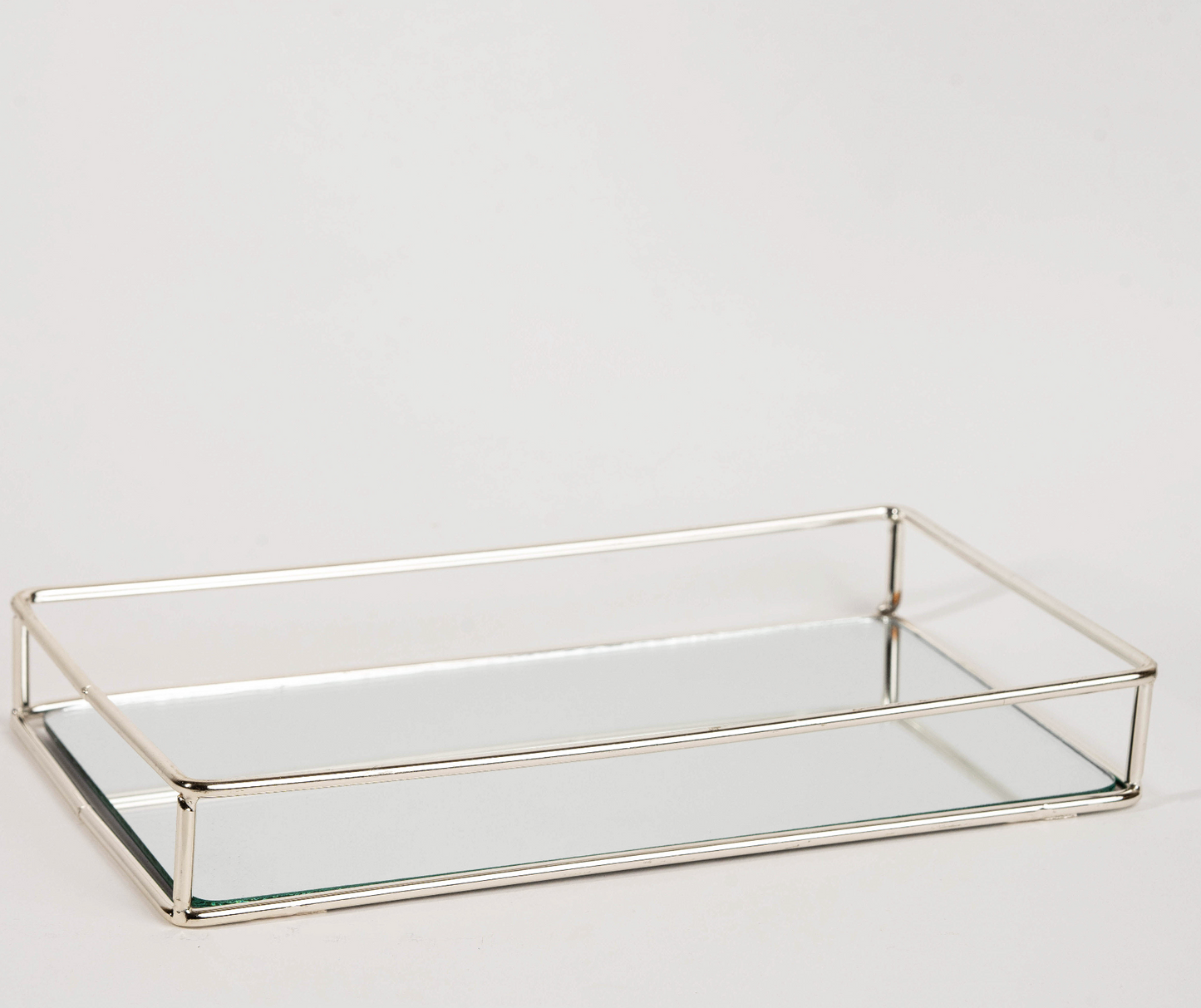 Elegant rectangular gold mirror tray with metal frame for home décor and serving"
