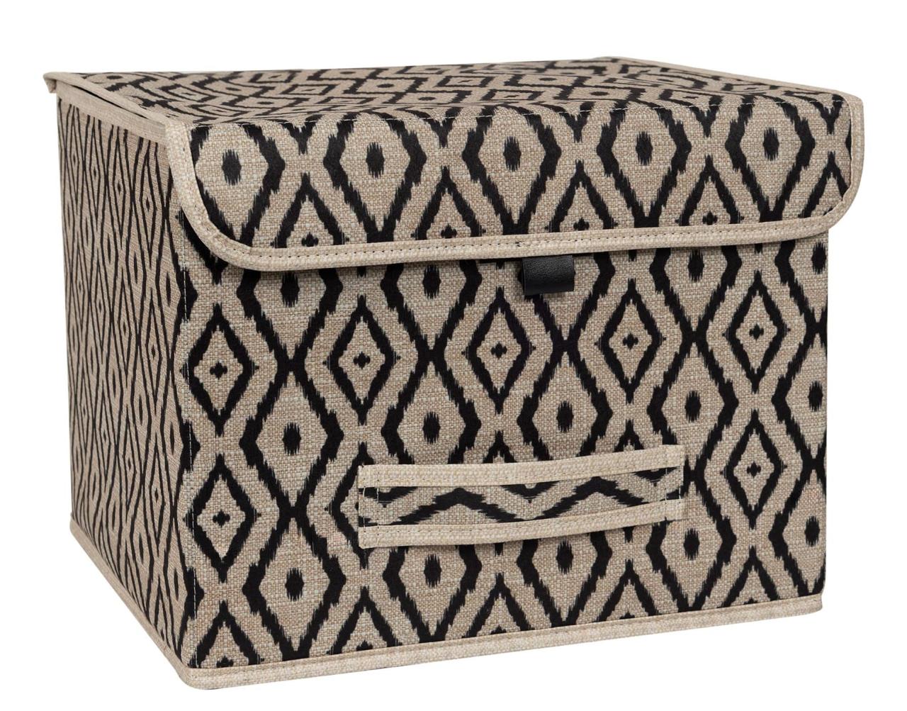 Beige and black diamond-patterned fabric storage box placed on a marble bathroom counter beside a sink.