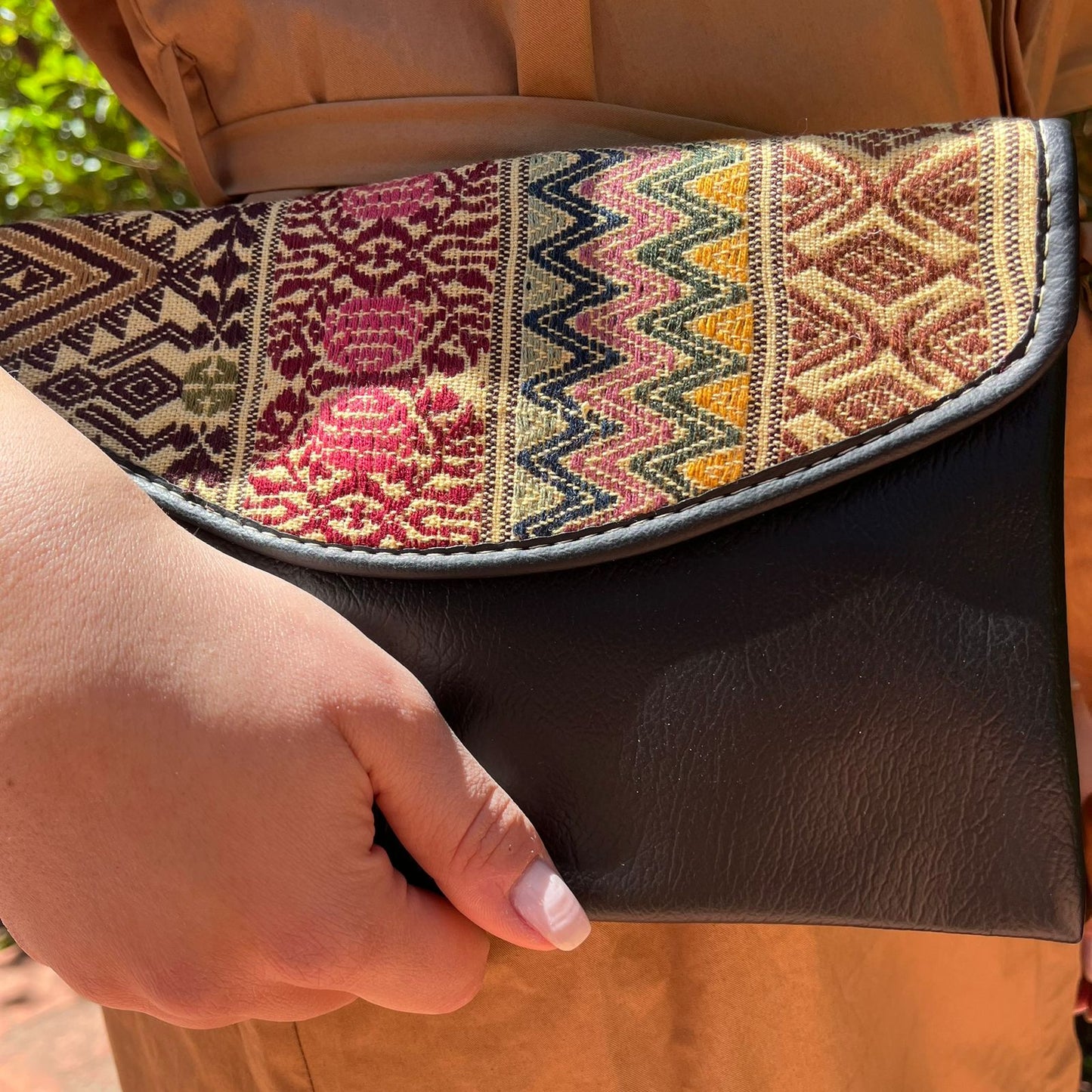 Elegant Black Leather Crossbody Bag with Ethnic Pattern Flap