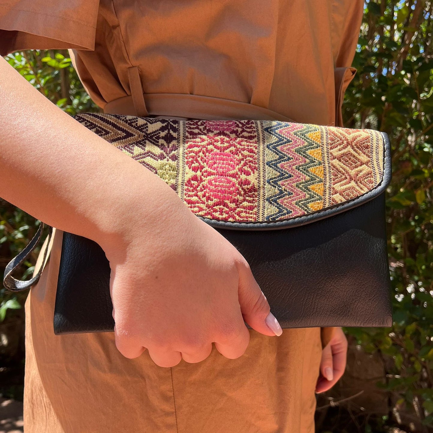Elegant Black Leather Crossbody Bag with Ethnic Pattern Flap