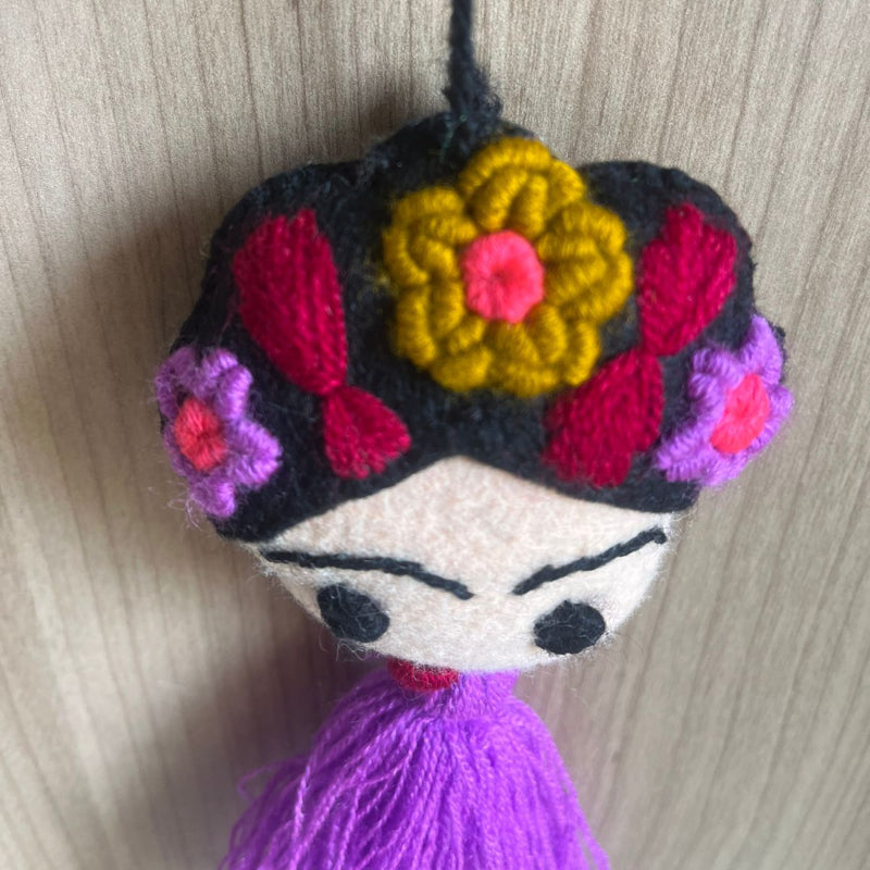 Handmade Frida Kahlo felt tassel ornament with colorful floral embroidery and purple tassel