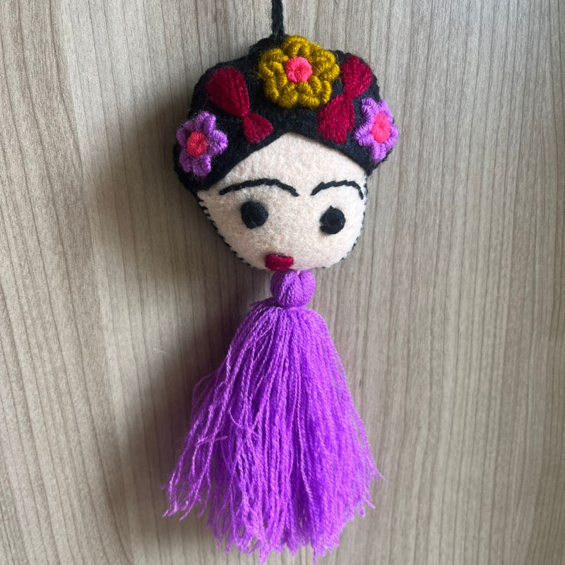 Handmade Frida Kahlo felt tassel ornament with colorful floral embroidery and purple tassel