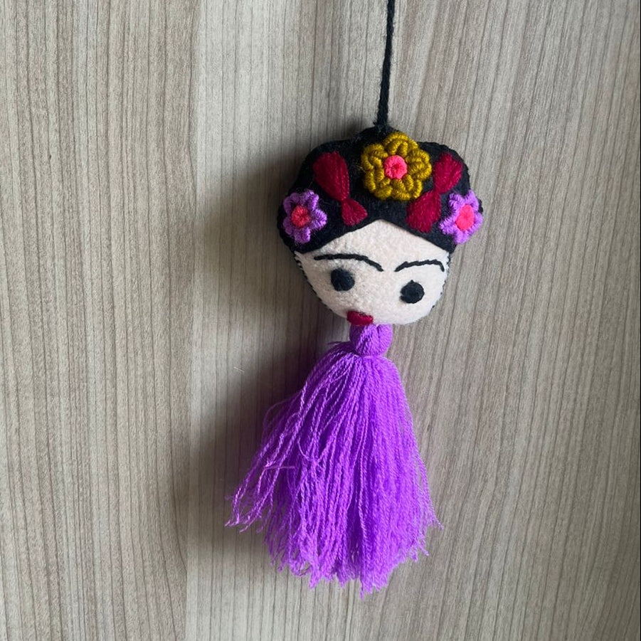 Handmade Frida Kahlo felt tassel ornament with colorful floral embroidery and purple tassel