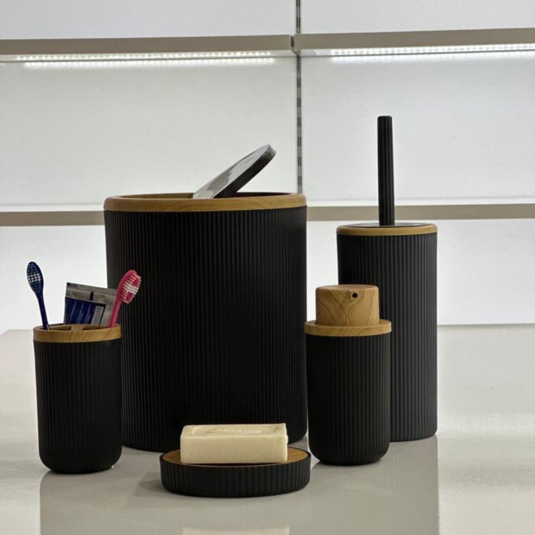 5-piece grey and wood wave bathroom accessory set on countertop