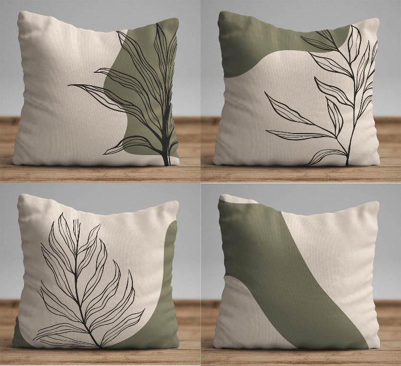 Minimalist botanical cushion cover with black leaf line art on beige fabric with olive green accent