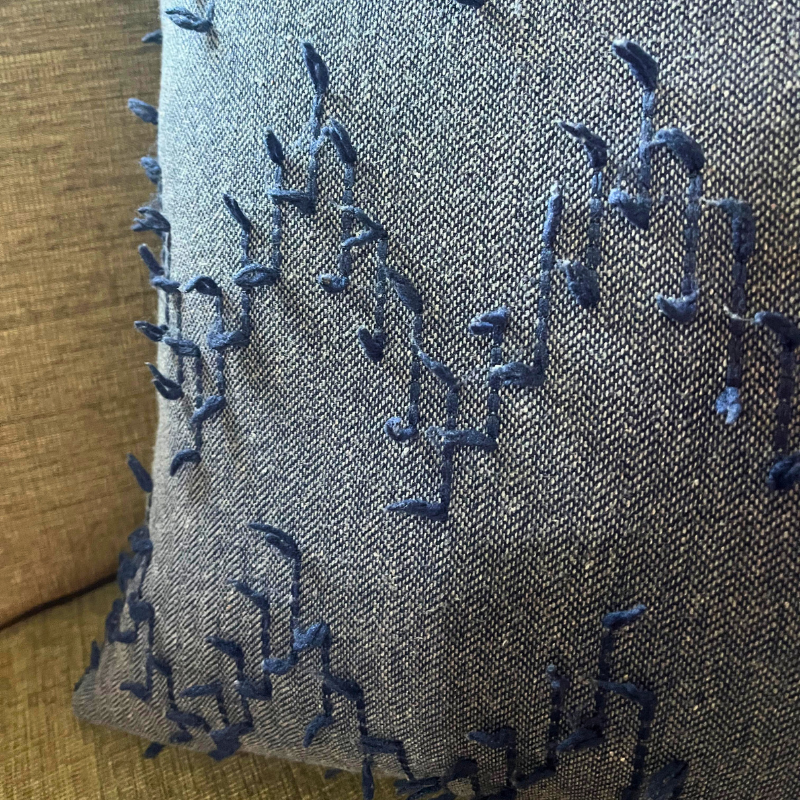 Polka Zigzag Collection – 43x43 cm Jeans Blue a embroidered cushion cover on beige sofa