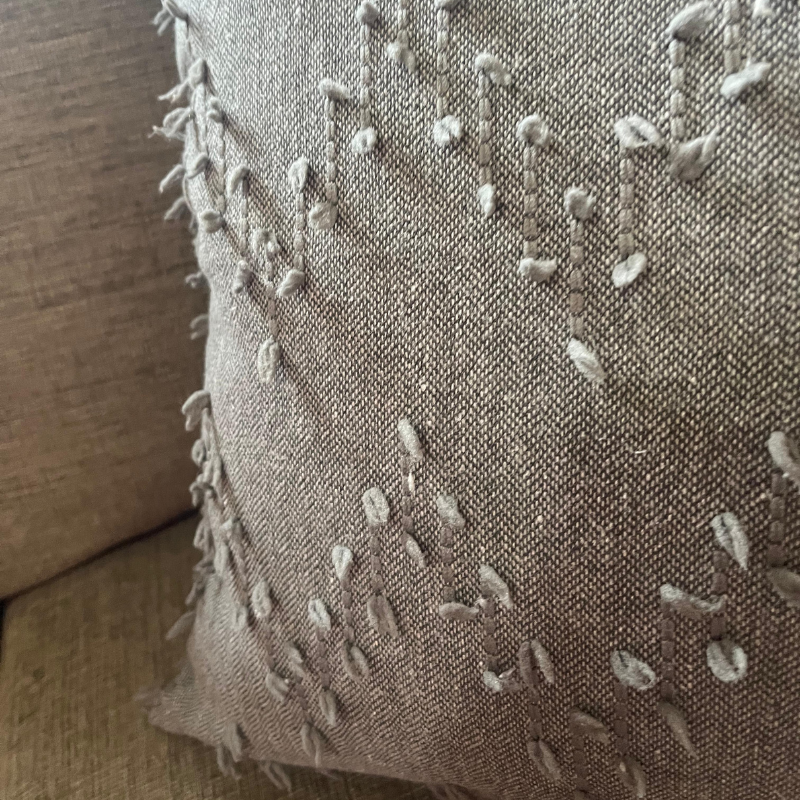 Polka Zigzag Collection – 43x43 cm Stone Grey a embroidered cushion cover on beige sofa