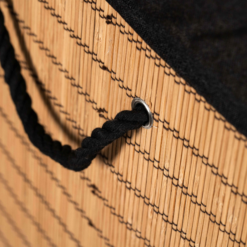 Rectangle bamboo laundry basket with lid and black fabric lining.