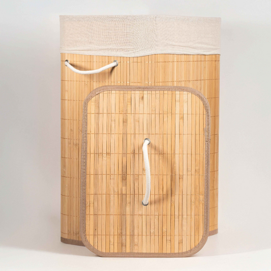 Round bamboo laundry basket with lid and off-white fabric lining.