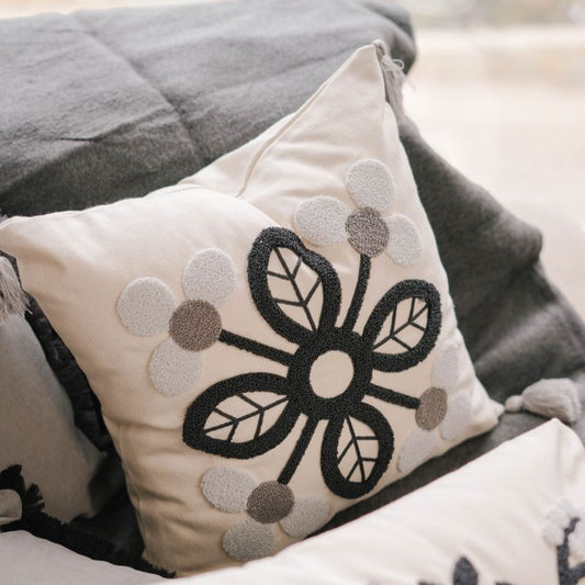 Timeless Collection square embroidered cushion cover in navy and grey petal motif with light grey tassels – 43x43 cm